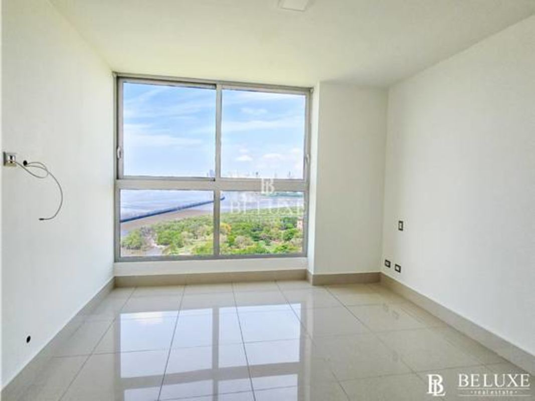 Bedroom with large window ocean view at PH Bali Costa del Este Panama