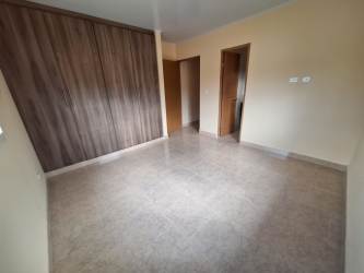 Modern tiled kitchen area ready for appliances in Santa Clara beach community