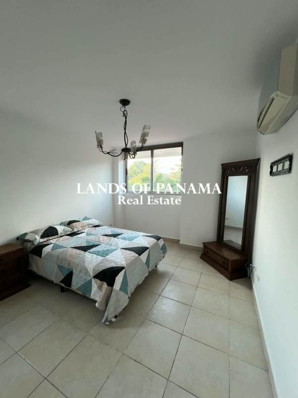 Private outdoor terrace with tiled floor adjacent to residential building PH Clayton Park I Panama