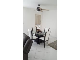 Living area with sectional sofa at Villa Azul Playa Blanca Panama