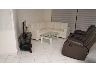 Bright dining area with ceiling fan at Villa Azul Playa Blanca Panama