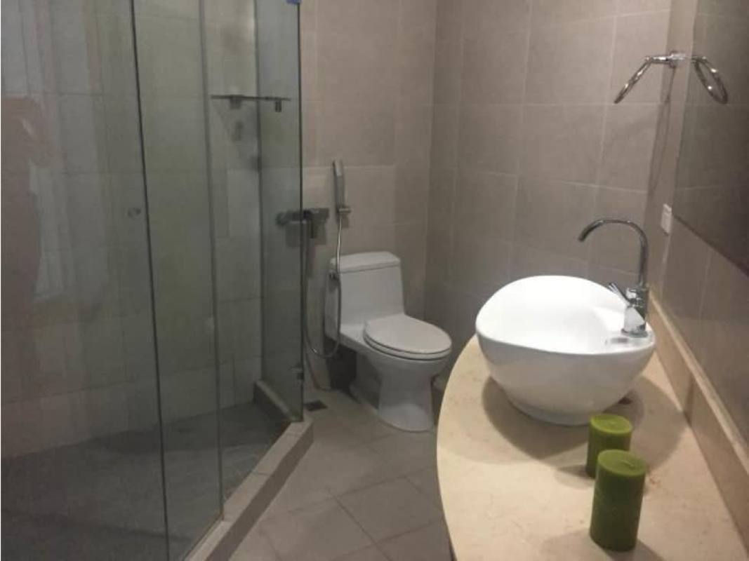 Modern bathroom with glass-enclosed shower and contemporary fixtures Costa del Este