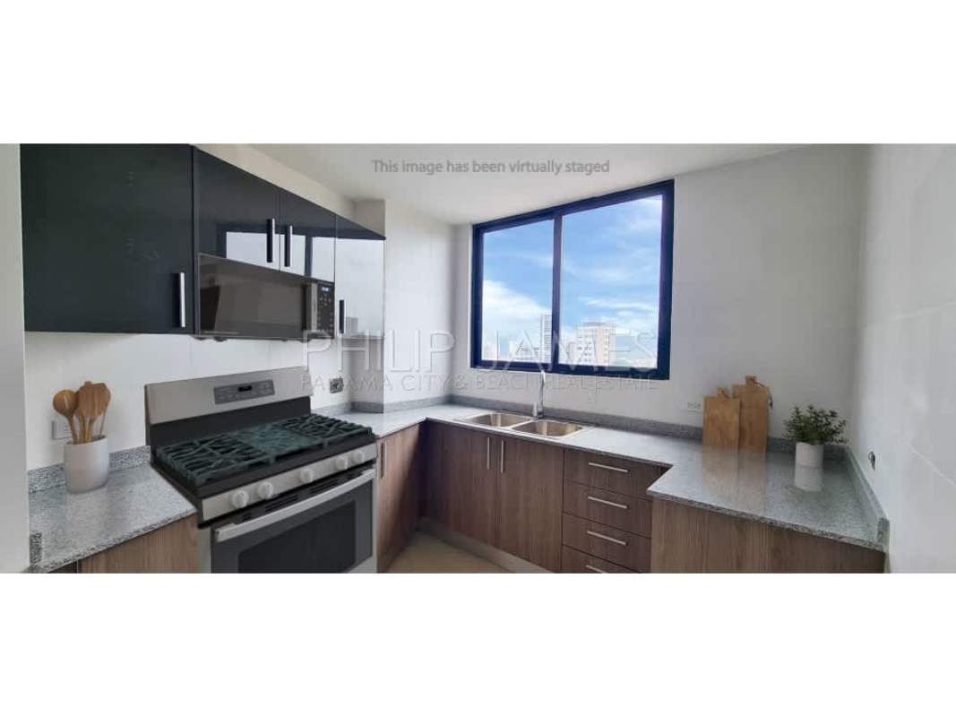 Virtually staged modern bedroom with large windows, city skyline views in Cranc Tower Panama