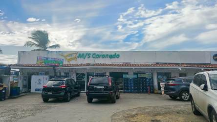 Wide sandy beach with gentle Pacific waves at Coronado beachfront lot Panama