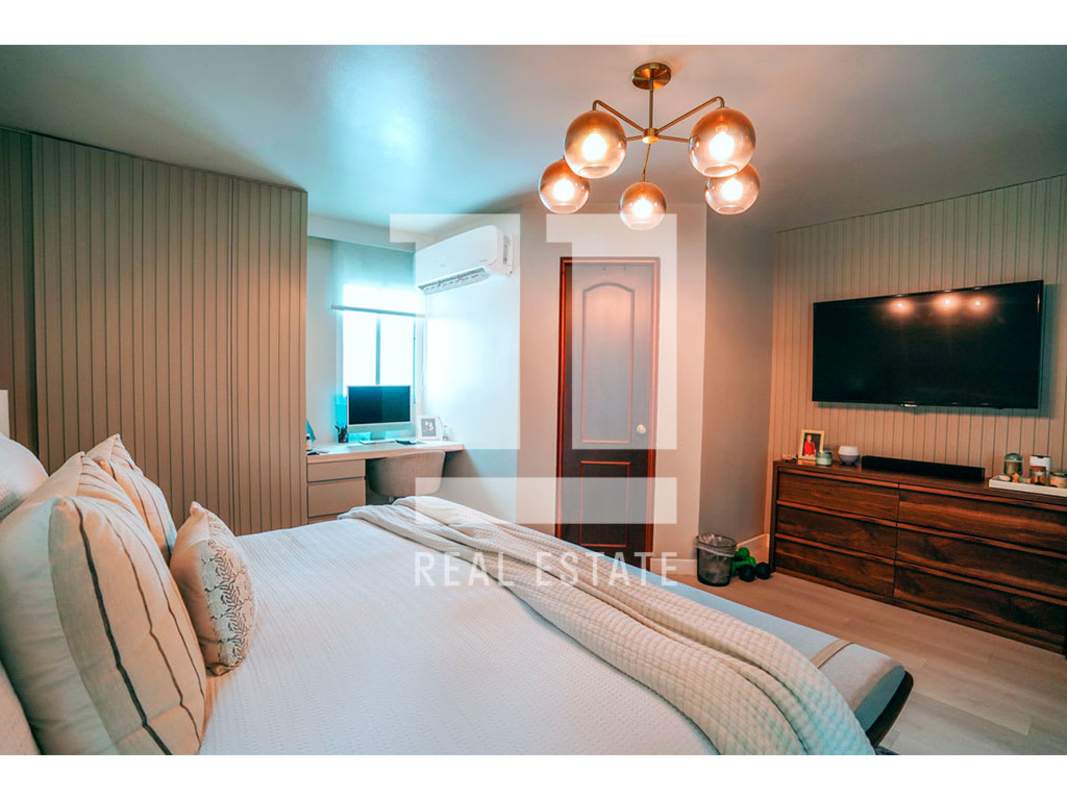 Playful child bedroom with pastel colors, wall shelves and toys PH Bahia Obarrio Panama