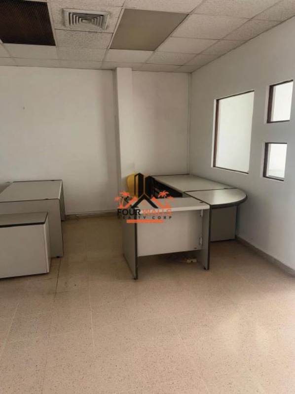 Private office interior with conference table, chairs, and cabinets Plaza Los Angeles Panama