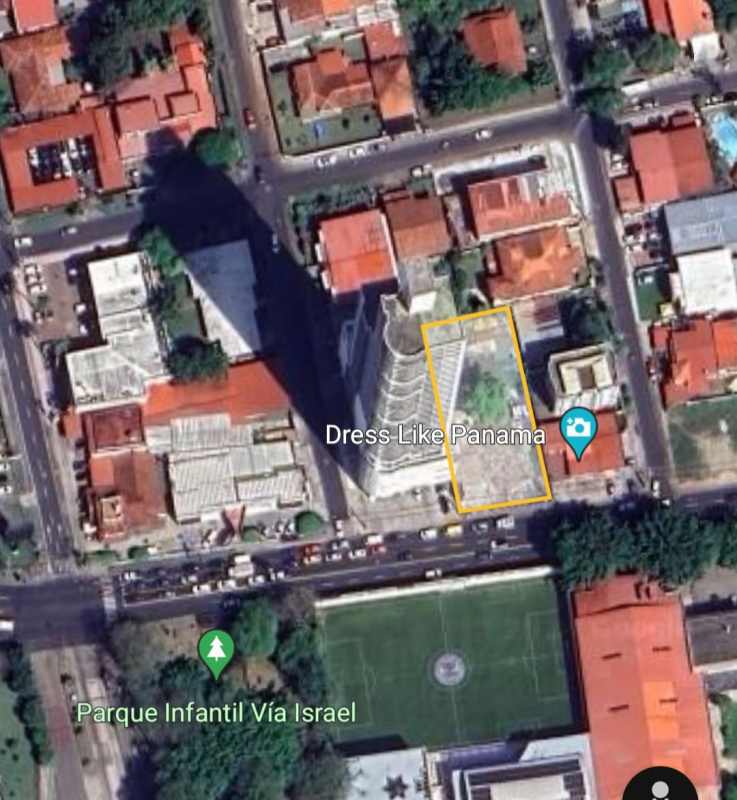 Aerial of city block with highlighted vacant lot near park and buildings Panama San Francisco