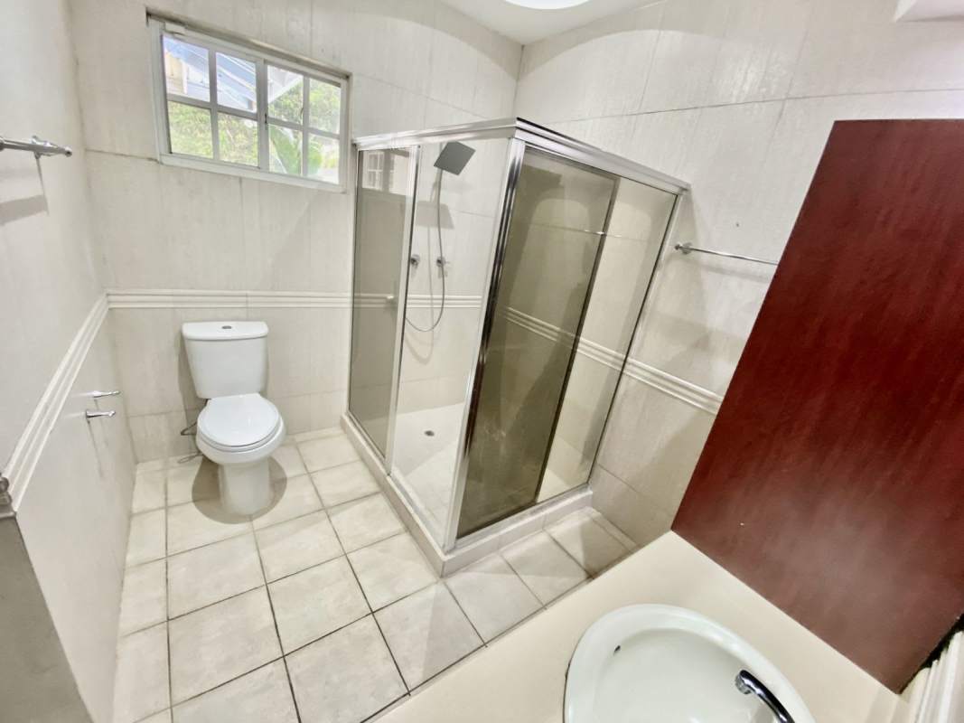 Modern living room with tray ceiling, tile floor, recessed lighting house for sale Albrook Panama