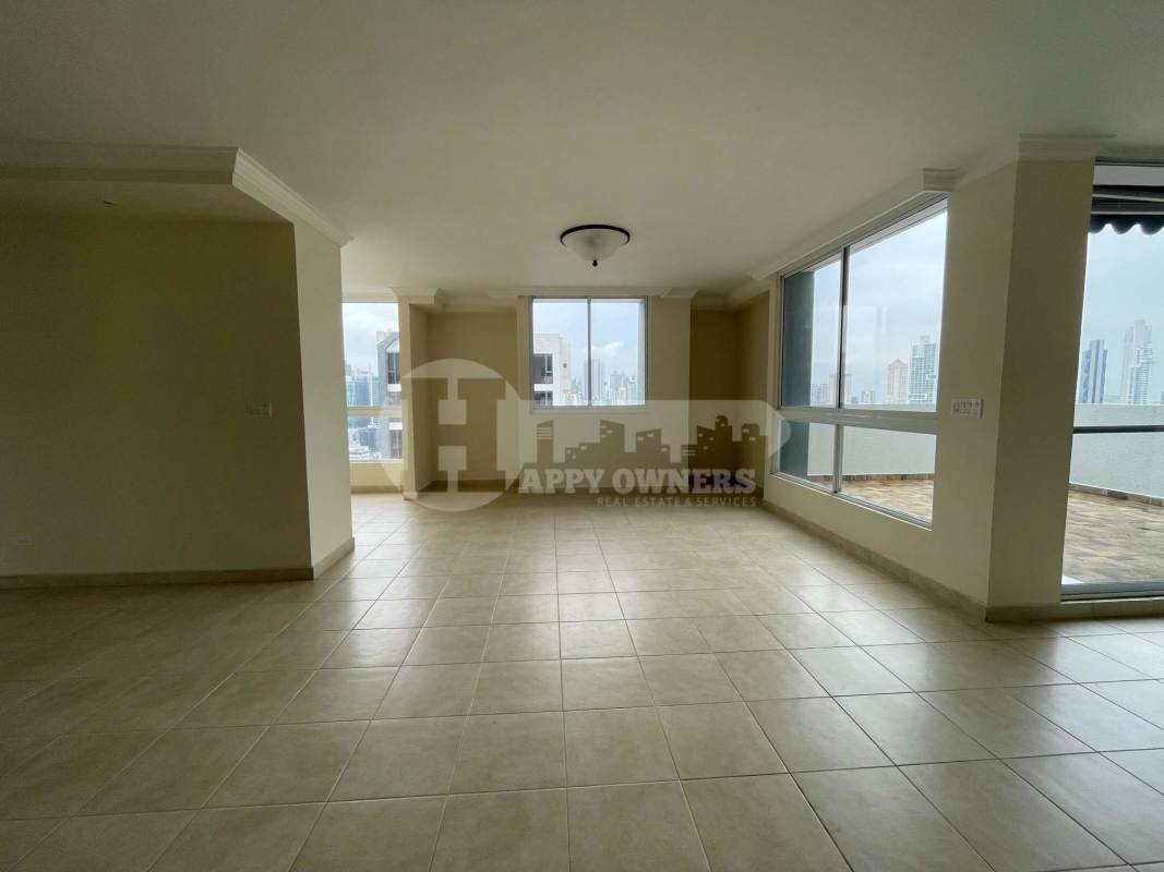 Modern kitchen with granite counters, tile backsplash, appliances penthouse PH Aurora Tower El Cangrejo Panama