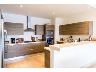 Gourmet kitchen with granite counters, imported appliances in luxury beach villa Panama