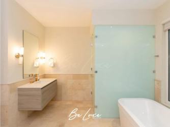 Designer bathroom with soaking tub, glass shower and premium fixtures in Panama villa