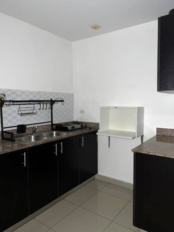 Kids' playground with indoor play structures and swings in PH Centennial Panama