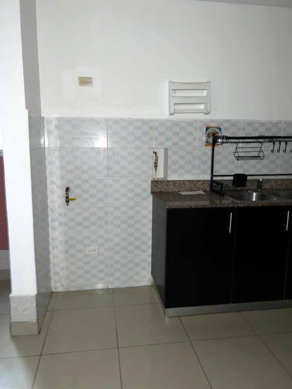 Secondary bedroom with window and tile floors PH Centennial Parque Lefevre Panama