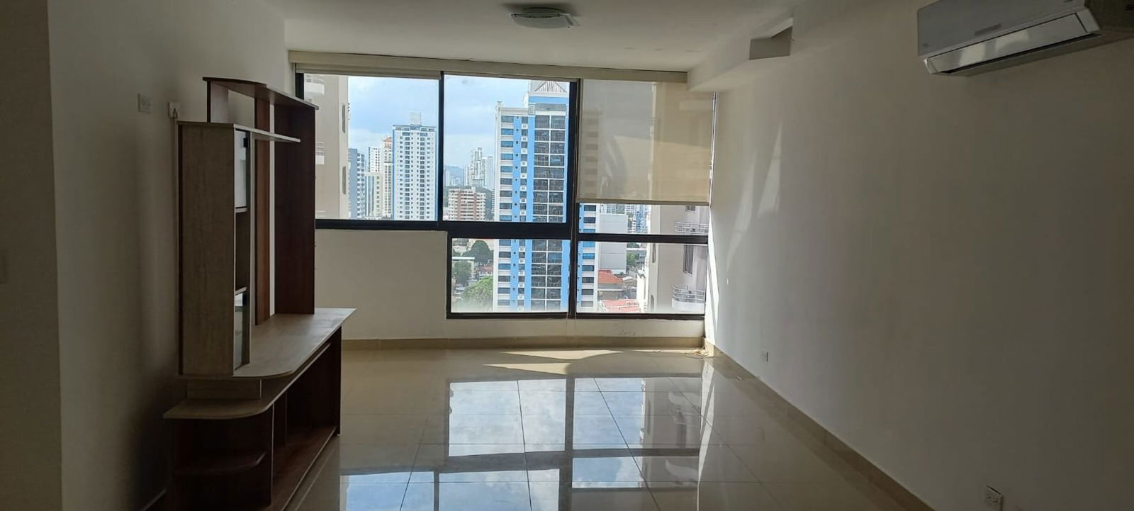 Spacious living room with floor-to-ceiling windows, tile floors at San Francisco Bay Tower 500 Panama City