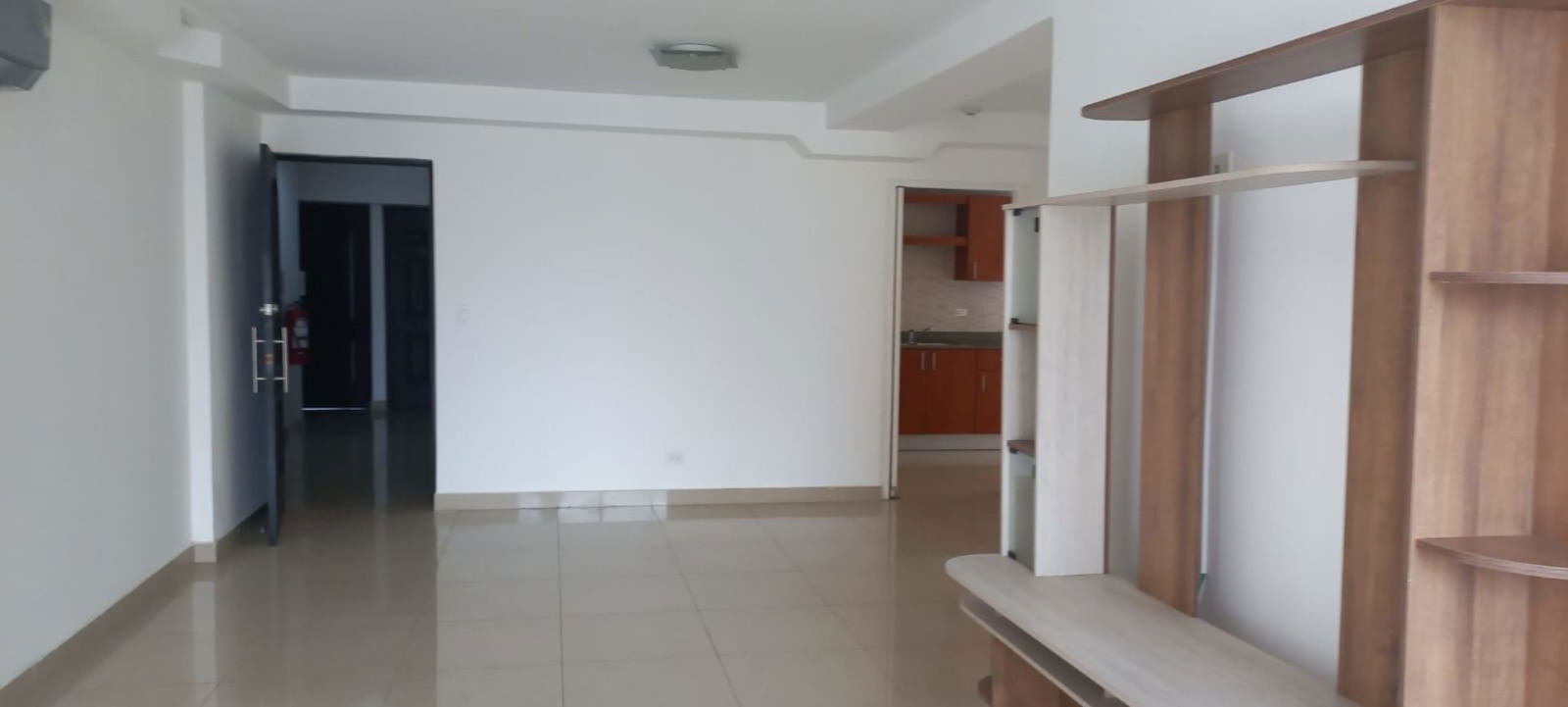 Open plan living and dining space with access to kitchen in San Francisco Bay Tower 500 Panama City