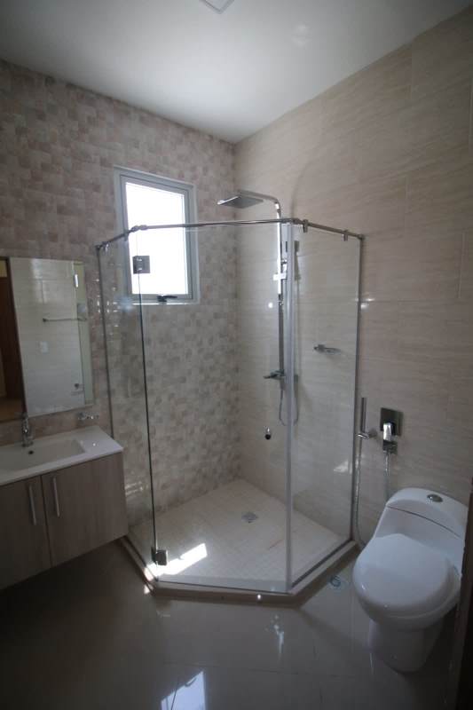 Bathroom with glass shower modern vanity neutral tones PH La Loma Hato Pintado Panama