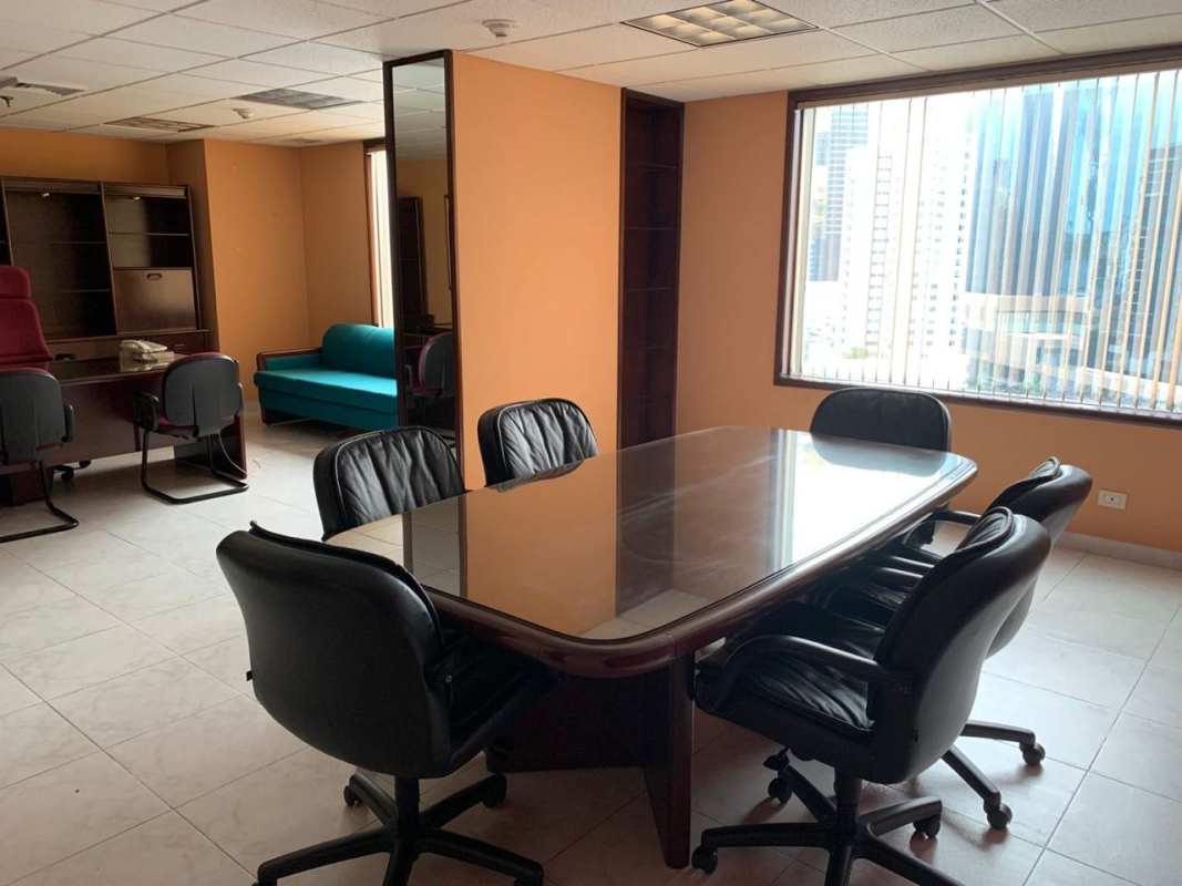 Spacious meeting room with city skyline view and glass table PH Century Tower Marbella Panama