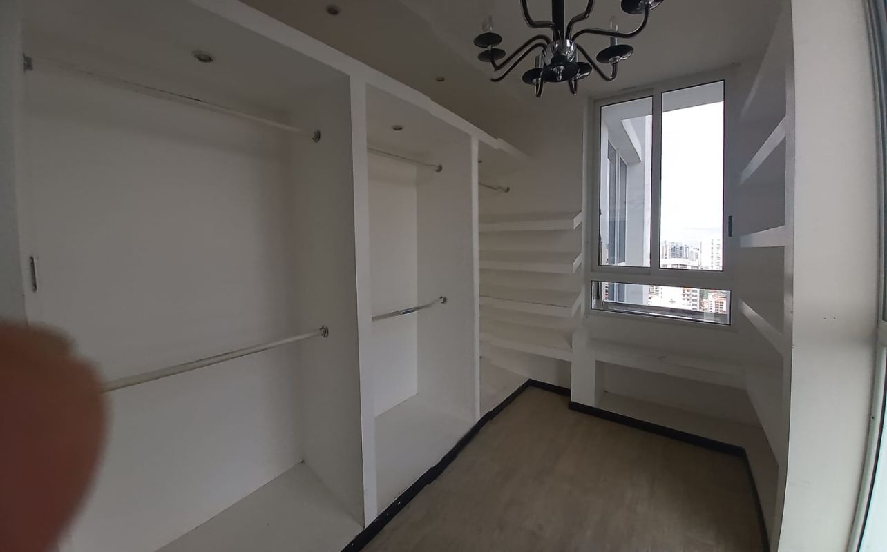 Modern kitchen with granite countertops, dark cabinets, stainless appliances in PH Quadrat San Francisco