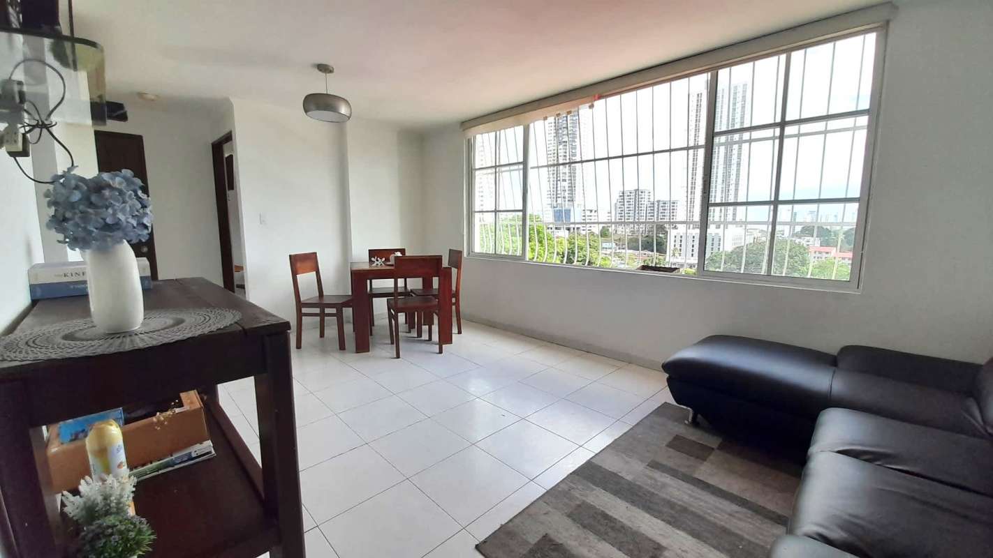 Spacious living area with large windows and city views PH Monterrey apartment La Loma Panama City