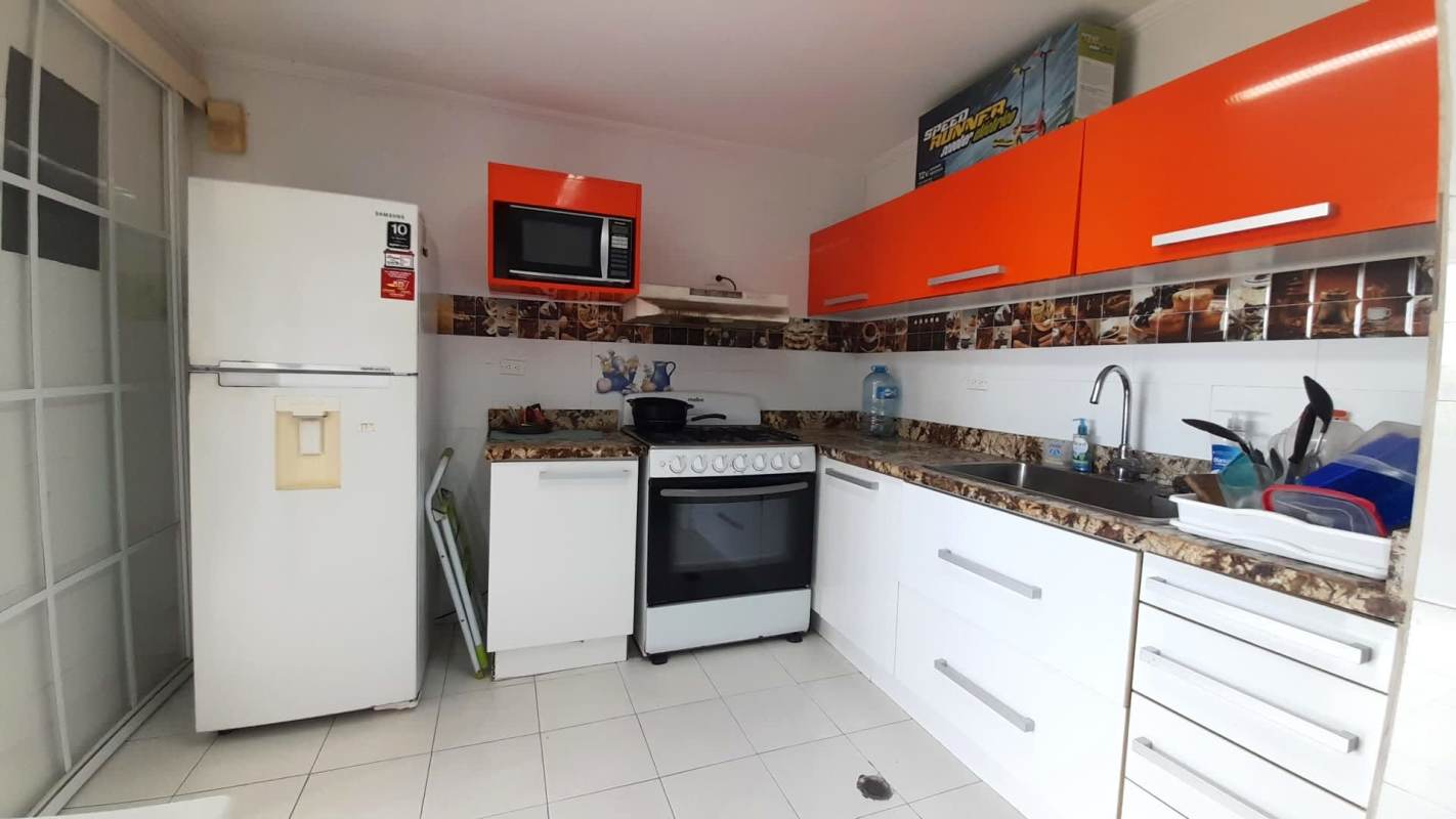 Minimalist bedroom with large window, AC, closet in PH Monterrey apartment Panama City