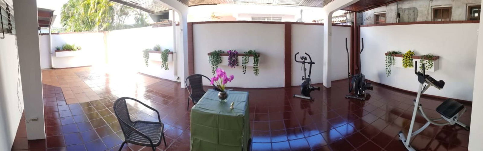 Granite countertop kitchen with wooden cabinetry in house for sale Chanis Panama City