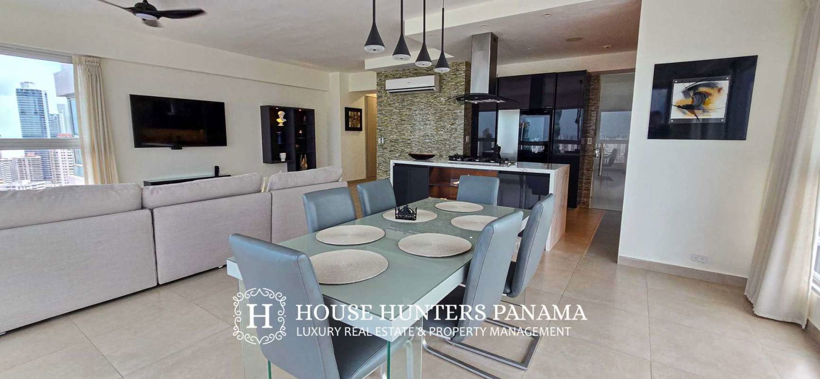 Modern bathroom with glass-enclosed shower, porcelain tile and elegant fixtures in Grand Bay Tower Panama