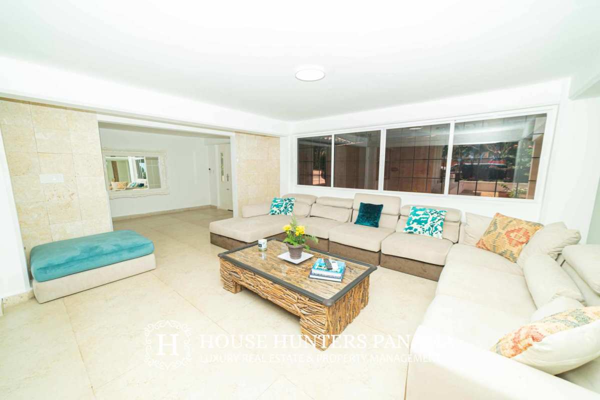 Bright living room with large windows, marble floors and modern lighting luxury mansion in Albrook Panama