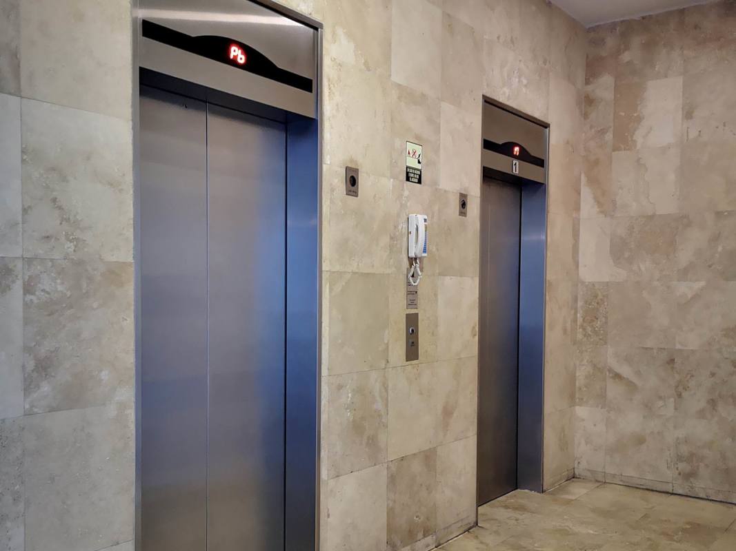 Stainless steel elevators in modern lobby PH Mont Royale Panama City