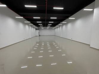 Empty finished commercial unit near Conway at Westland Mall with polished floors and open layout