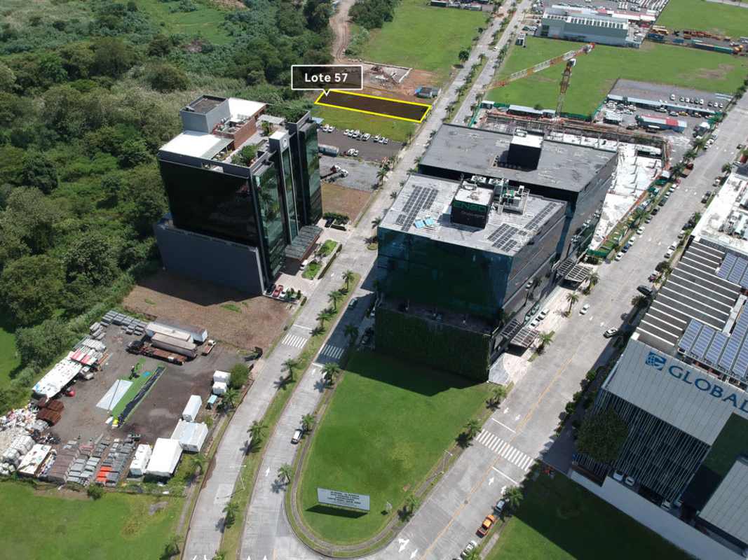 Commercial vacant lot in Santa María Business District Panama showing Lote 57 with nearby office buildings and road access