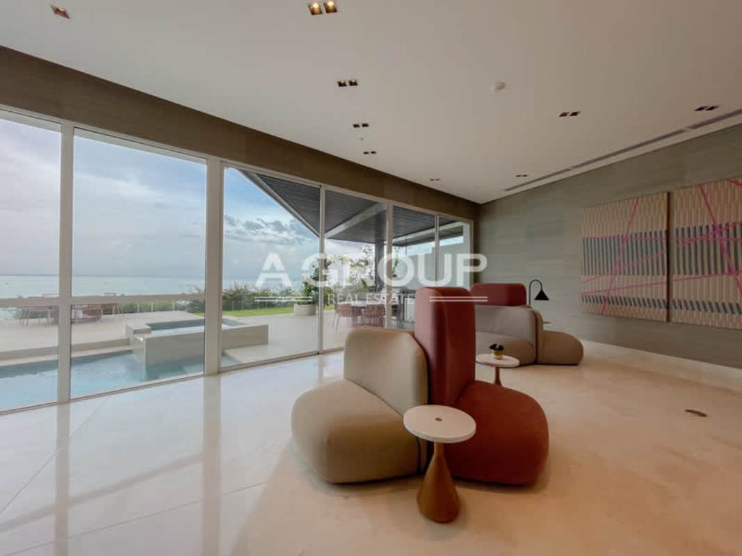 Modern kitchen with granite countertops floor to ceiling windows overlooking ocean at PH Ocean Reef Islands Panama