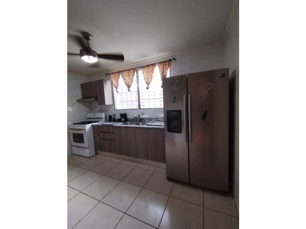 Kitchen with stainless appliances, granite counters, ceiling fan Brisas del Golf house Panama