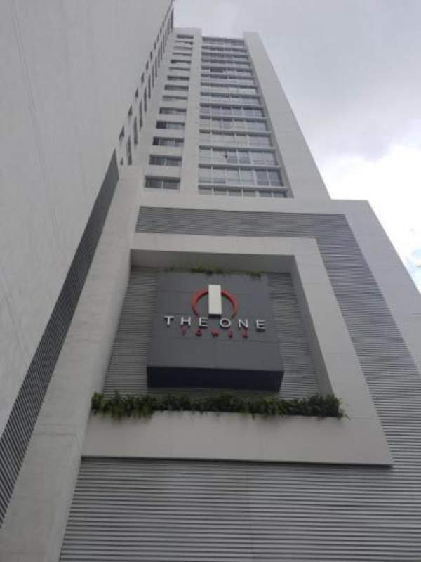 Facade of PH The One Tower, modern high-rise in San Francisco, Panama City for sale