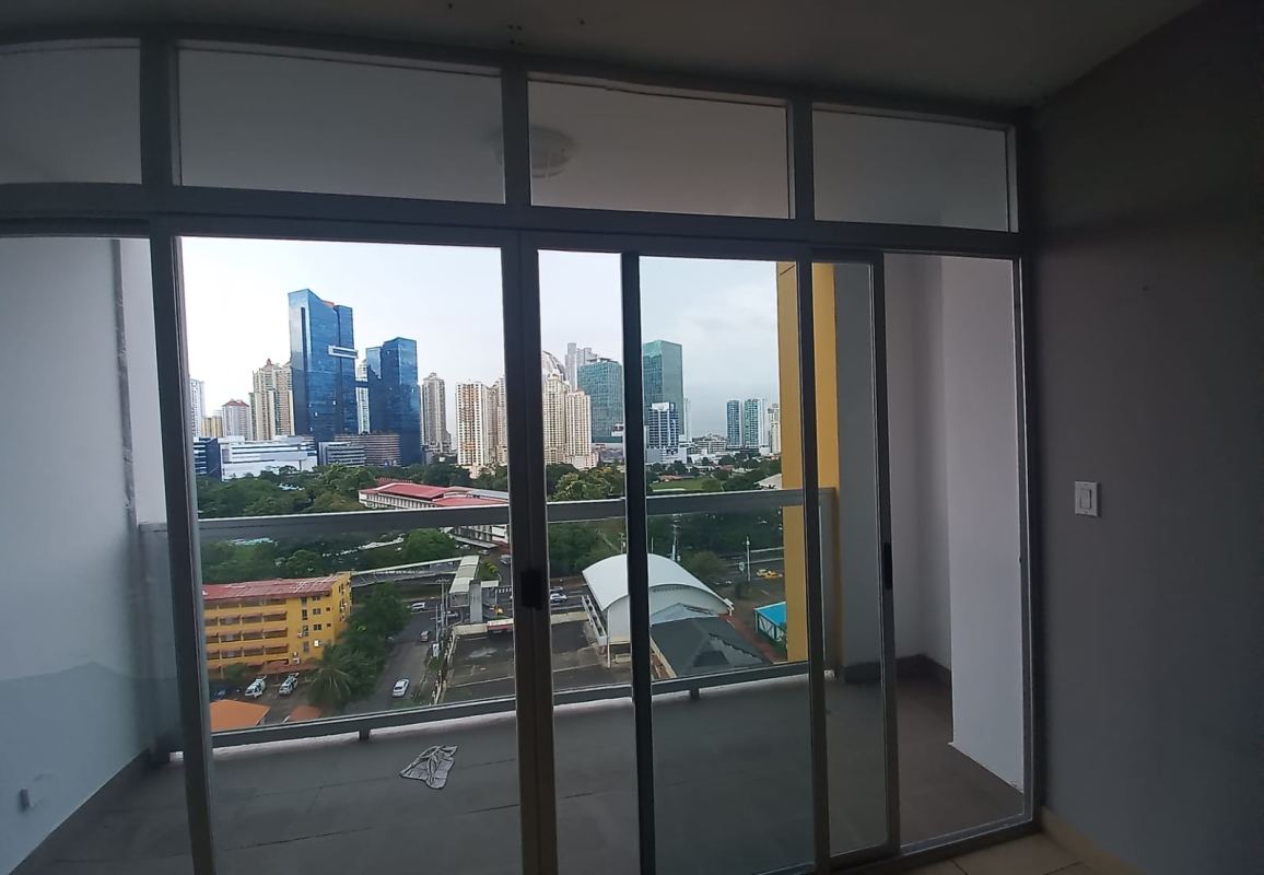 Contemporary kitchen with black granite countertop and cabinetry PH The One Tower San Francisco Panama City