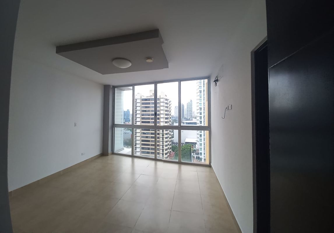 Bright living room with city skyline views and large windows PH The One Tower San Francisco