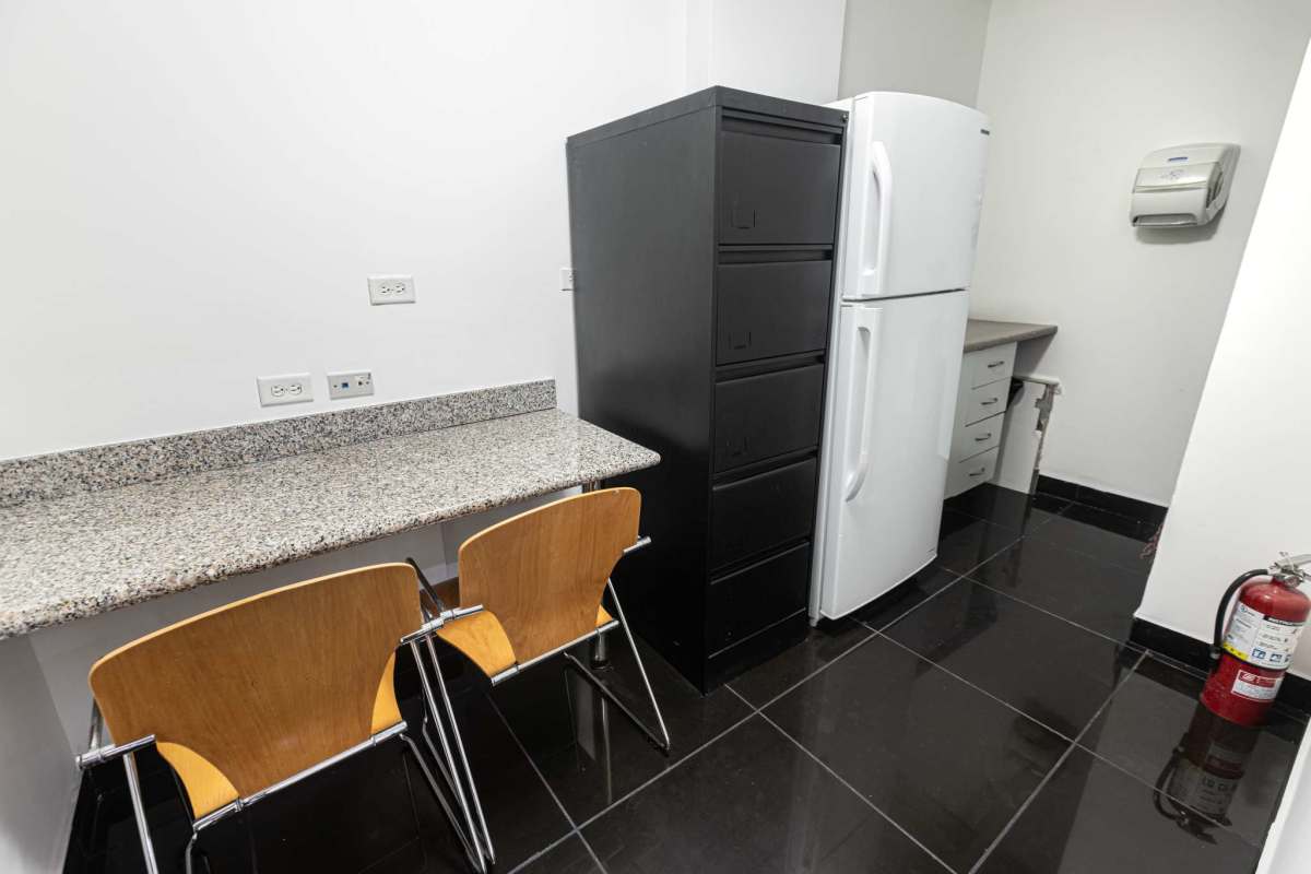 Contemporary glass facade building PH Office One in Panama financial district