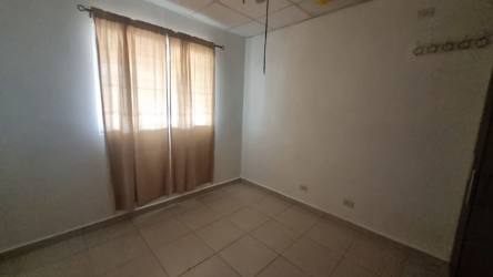 Bedroom with built-in wardrobe tiled floor in Sausalito Hills rental house La Chorrera Panama