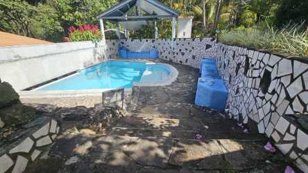 Mountain home with private swimming pool lush garden and tropical landscaping in Panama