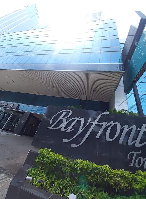 Modern bathroom with built-in jacuzzi tub window glass door PH Bayfront Tower Panama