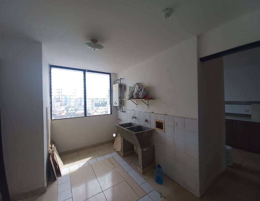 Laundry room with utility sink and window in PH Marbella Tower Panama City