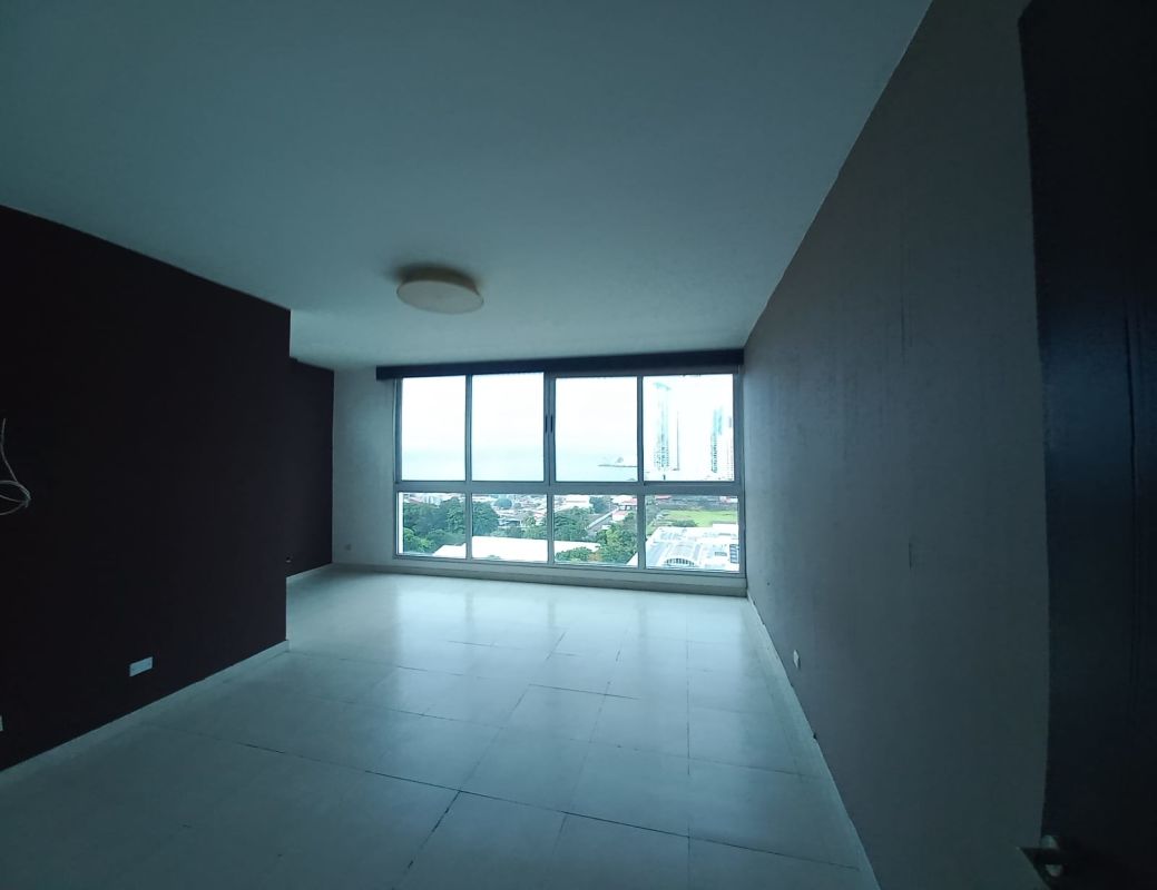 Modern bathroom large mirror glass-enclosed shower granite countertop PH Marina Plaza San Francisco Panama