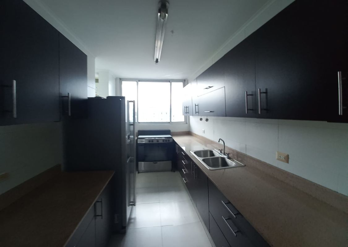 Bedroom large windows built-in wardrobe city and ocean view at PH Marina Plaza Panama City