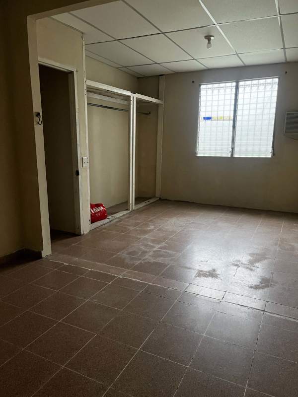 Interior hallway with neutral walls and tile flooring in Ciudad Bolívar house Panama