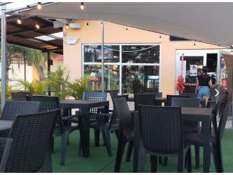Bar counter with multiple beer taps equipment Sandbar Gastropub Punta Barco Coronado