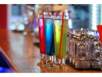 Colorful bar interior design with signage TVs Sandbar Gastropub Coronado Panama