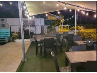 Stage and entertainment setup Sandbar Gastropub Punta Barco Coronado Panama commercial