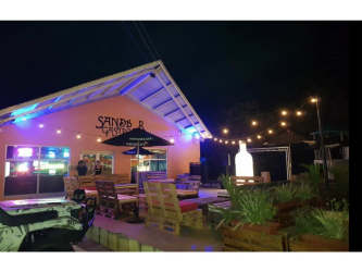 Creative cocktail drinks on bar counter Sandbar Gastropub Punta Barco Coronado Panama