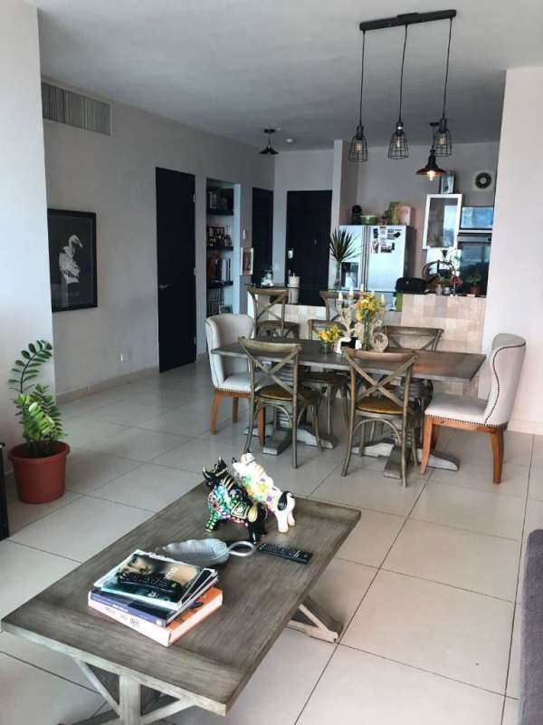 Spacious open-plan living & dining with contemporary kitchen, pendant lights, decor Destiny Tower Panama City