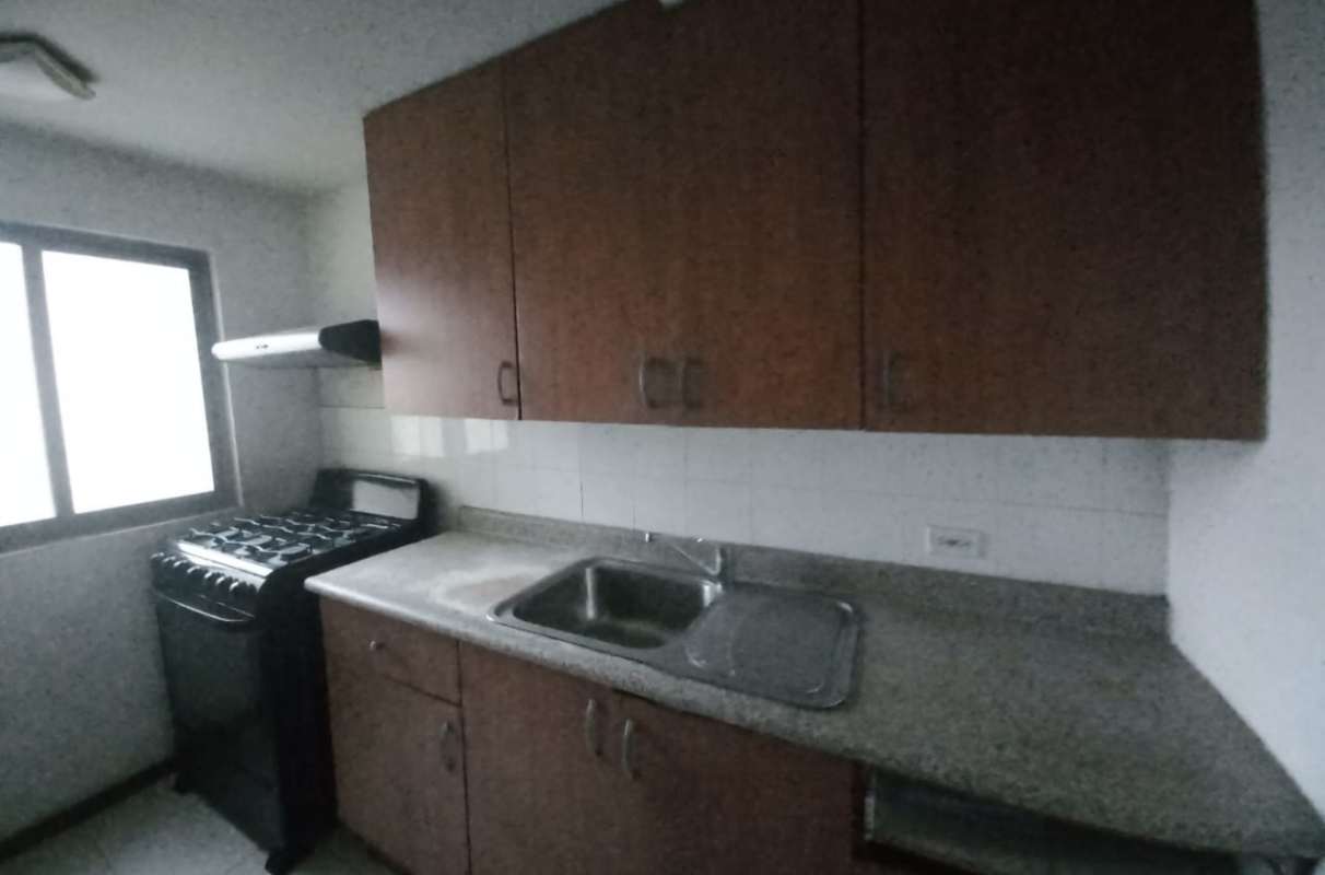 Kitchen with granite countertops and window at PH Pacific Wind Punta Pacifica