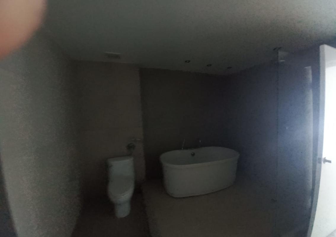 Bathroom with shower, vanity sink, and modern tile at PH Pacific Wind